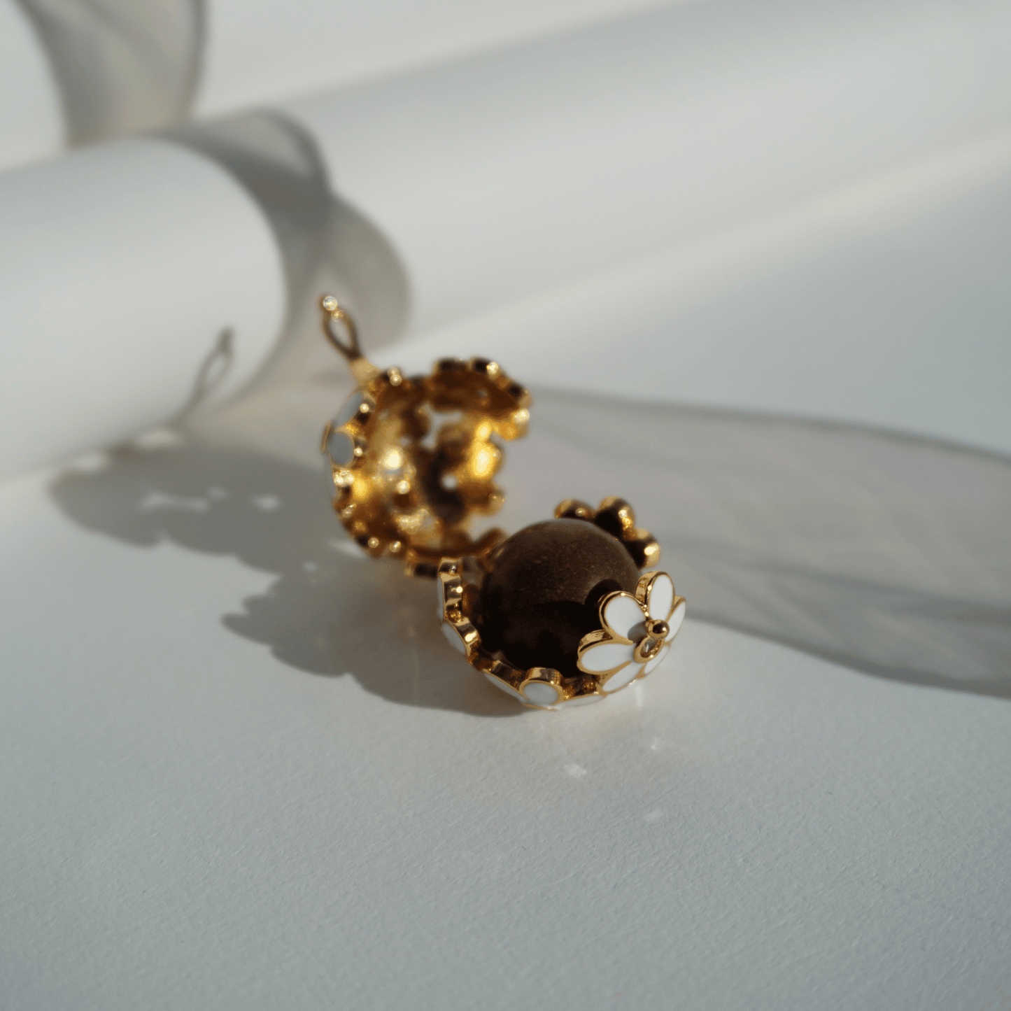 Botanical Pearl spiritual resin bead with calming aroma_in_golden_cage