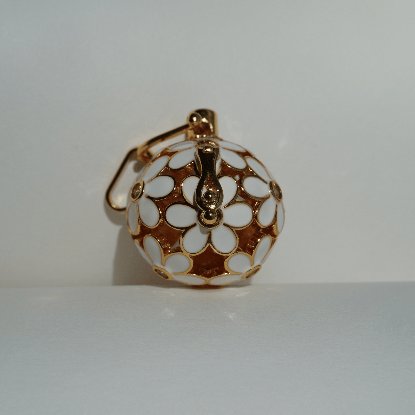 Gold floral cage pendant holder for ritual or crystal beads_1