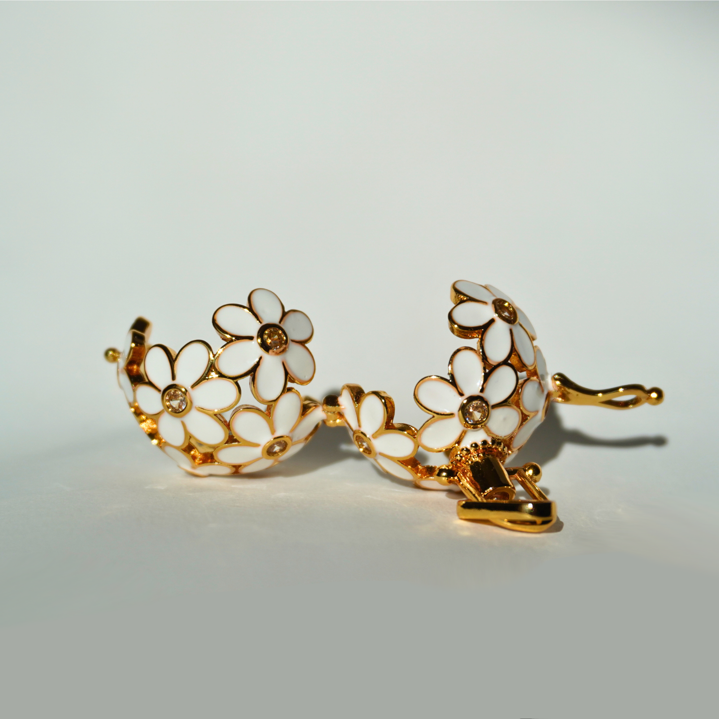 Gold floral cage pendant holder for ritual or crystal beads_close_up_top_view