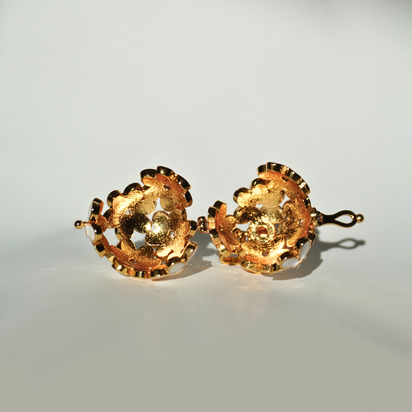 Gold floral cage pendant holder for ritual or crystal beads_inside_view