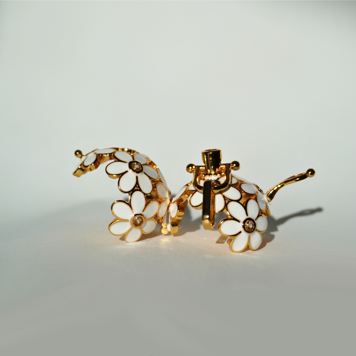 Gold floral cage pendant holder for ritual or crystal beads_open