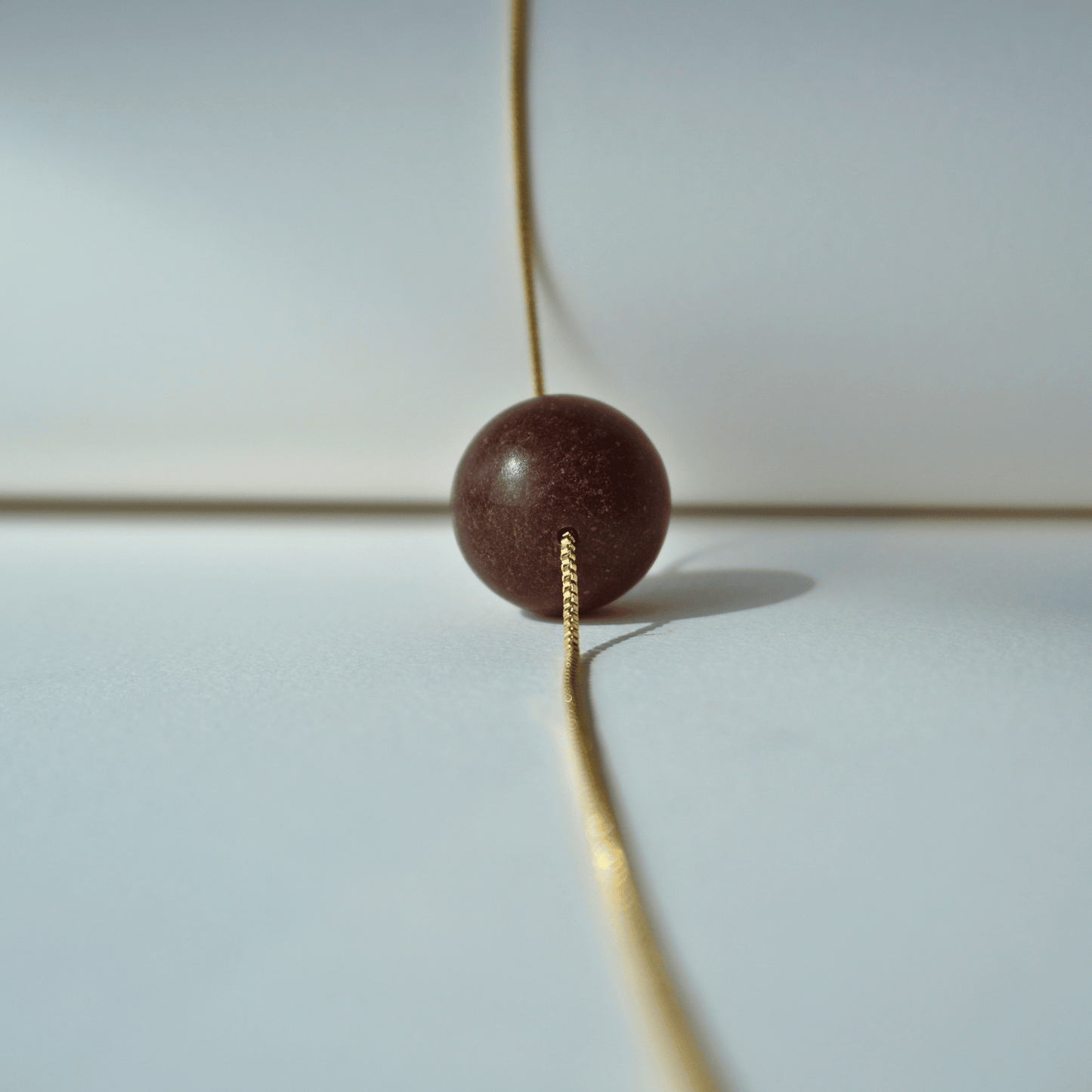One-Size-Fits-All Chain with Rubber Stop Bead & Pin Closure_running_through_a_bead
