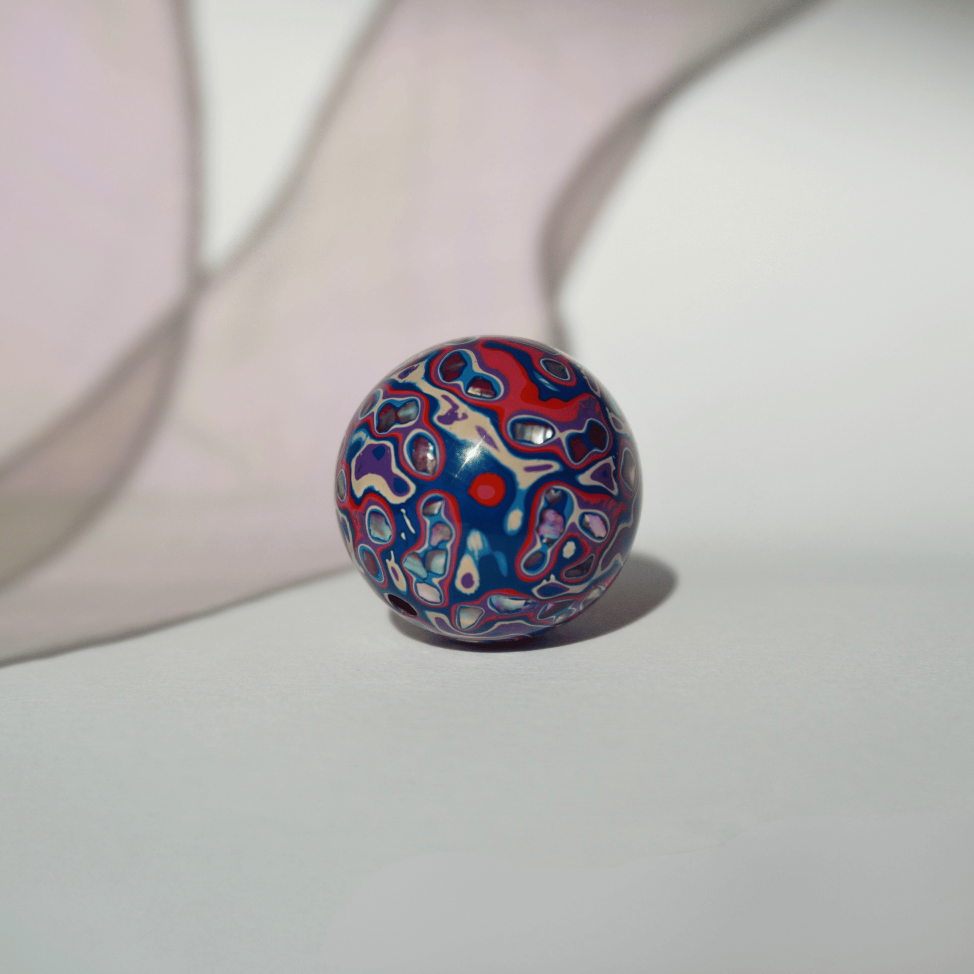 Bubble Blue ritual bead with iridescent pastel glow in organic resin_1