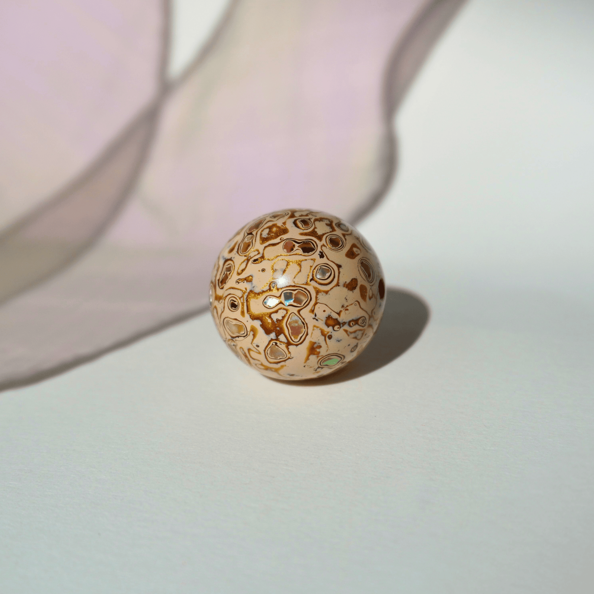 Desert Fortune ritual bead with burnished gold-copper tones, botanical resin_1