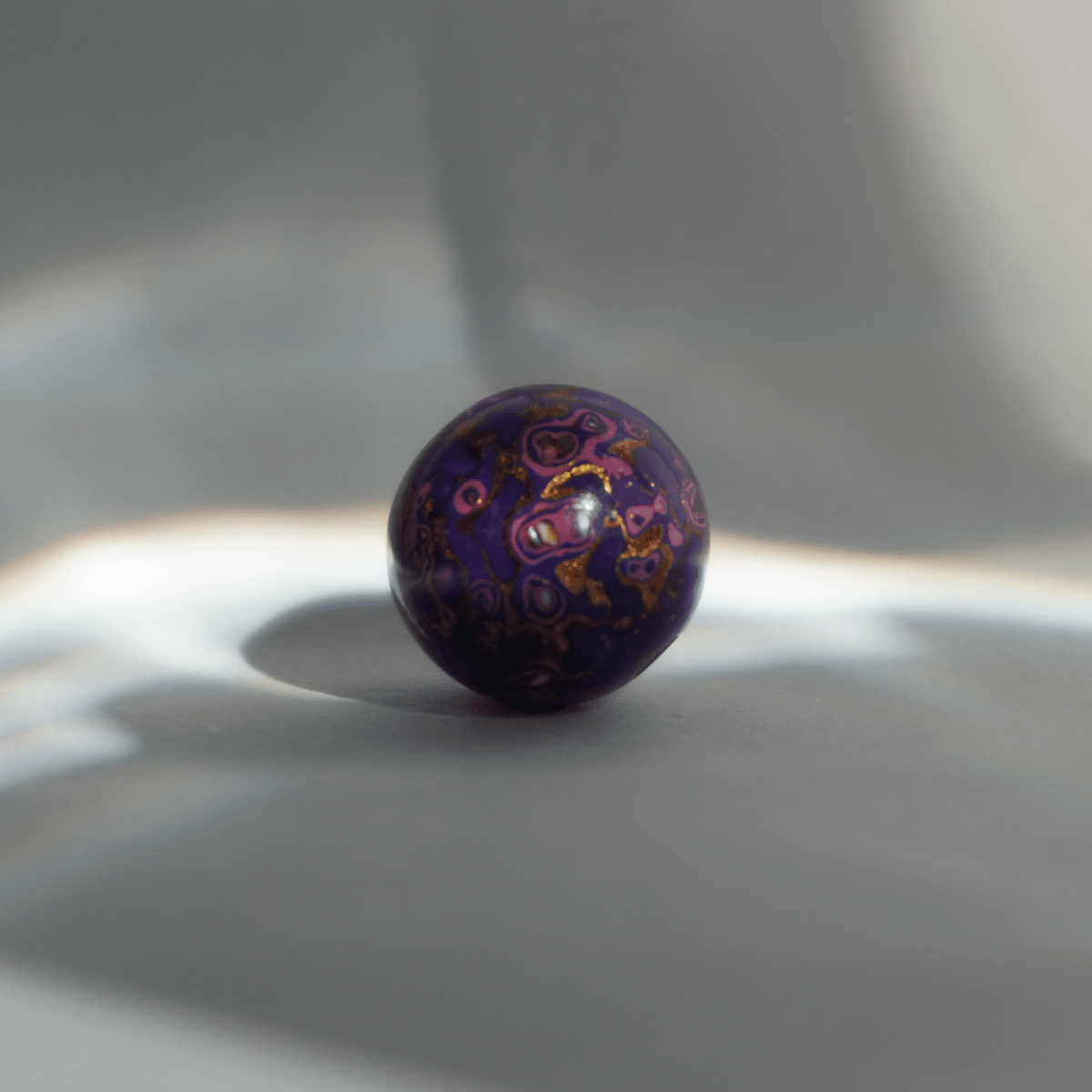 Gilded Eggplant bead in deep plum and gold leaf, polished organic resin_1