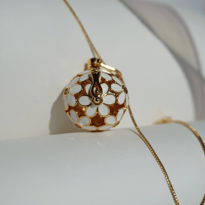 Gold floral cage pendant holder for crystal beads_close_up_with_chain