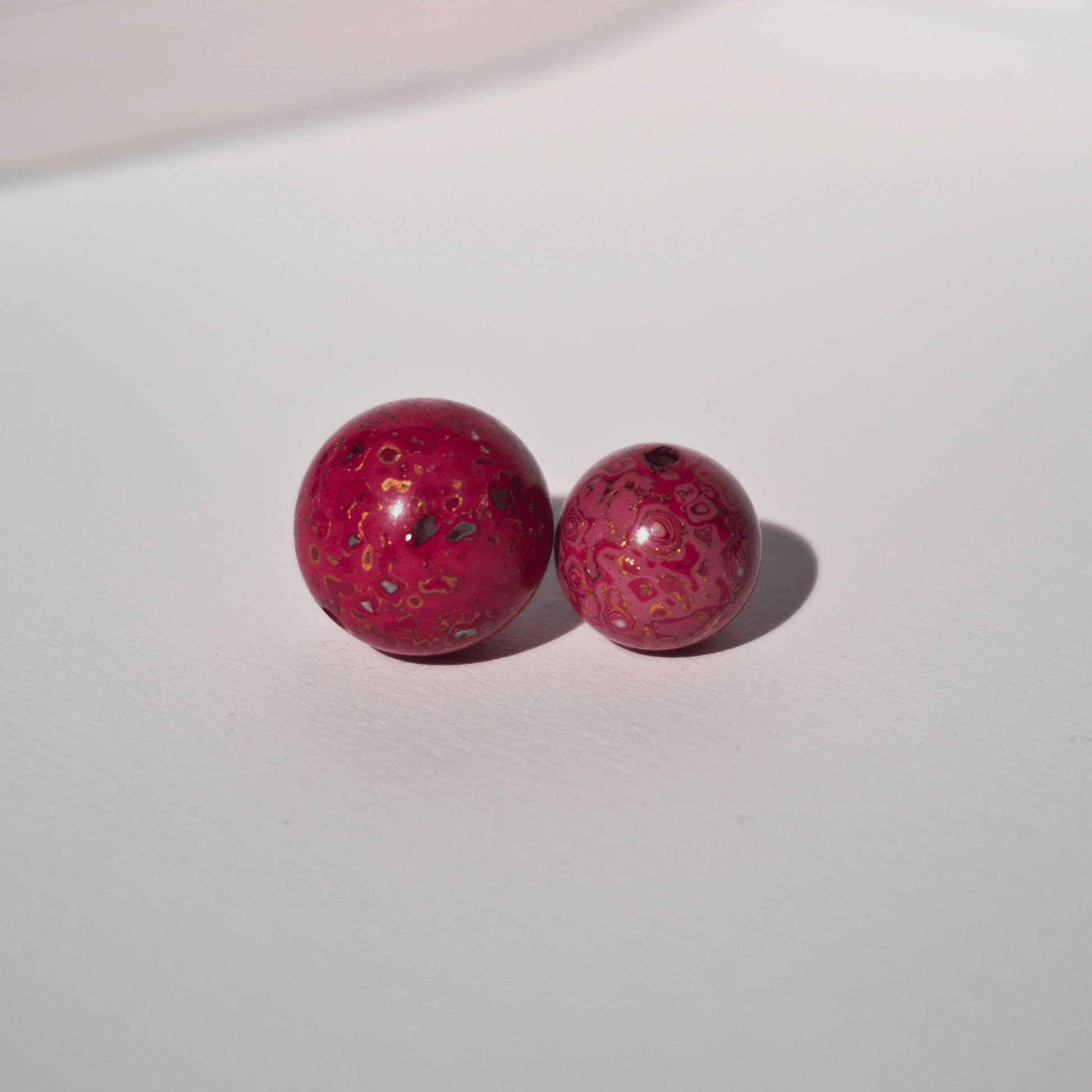 Raspberry Wine ritual bead with burgundy swirls in hand-polished organic resin_duo_beads
