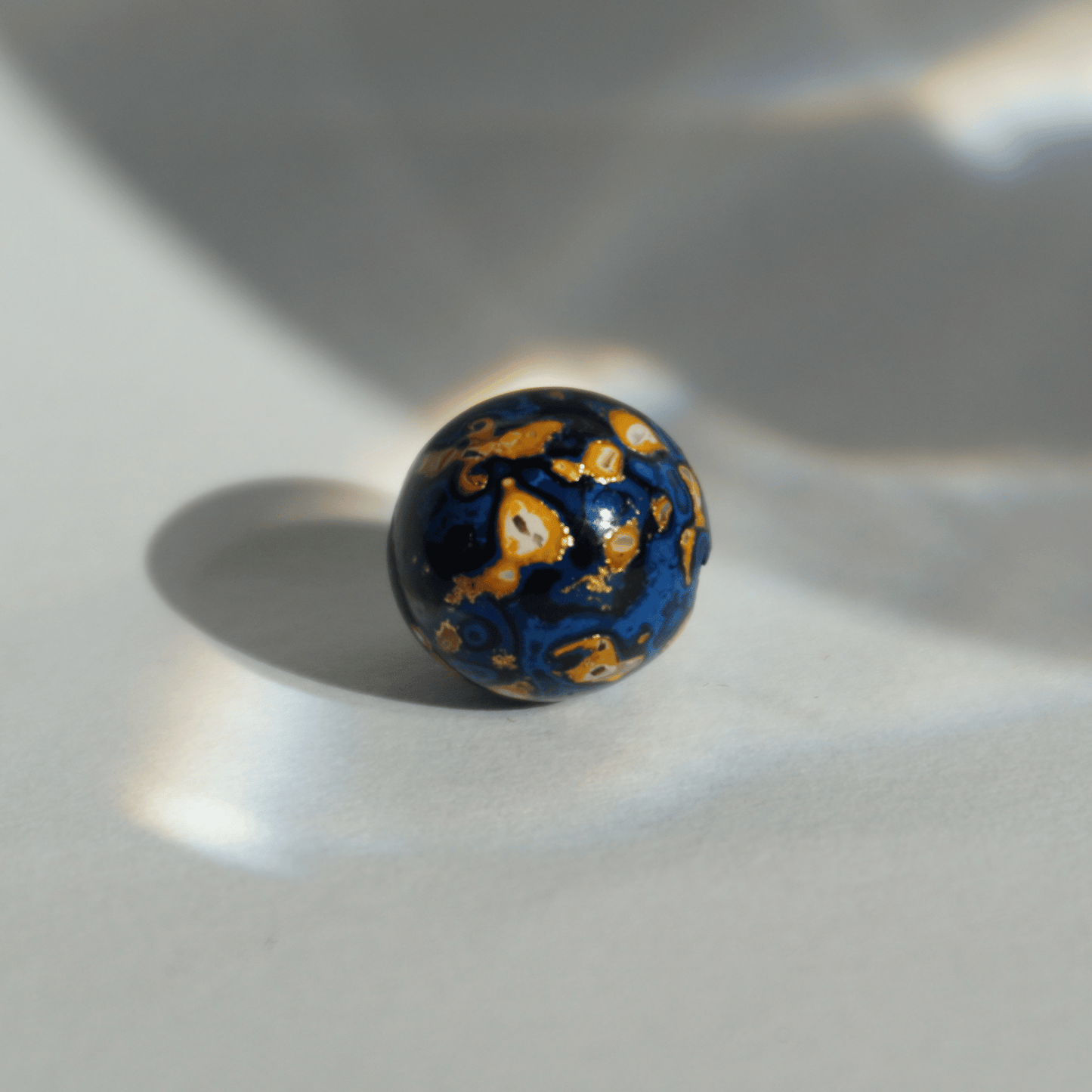 Indigo Desert bead with celestial gold veining, handcrafted in plant-based resin_1