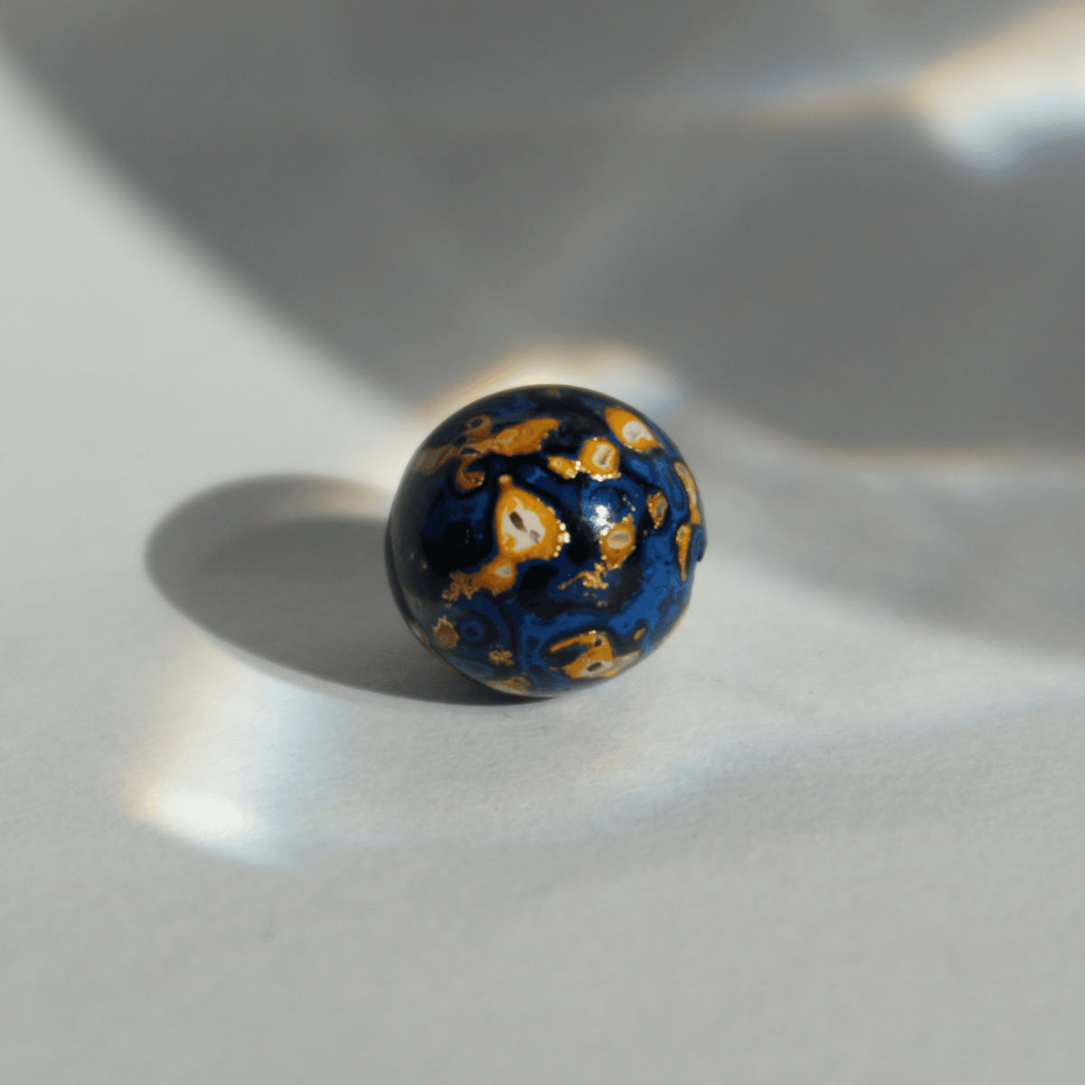 Indigo Desert bead with celestial gold veining, handcrafted in plant-based resin_1