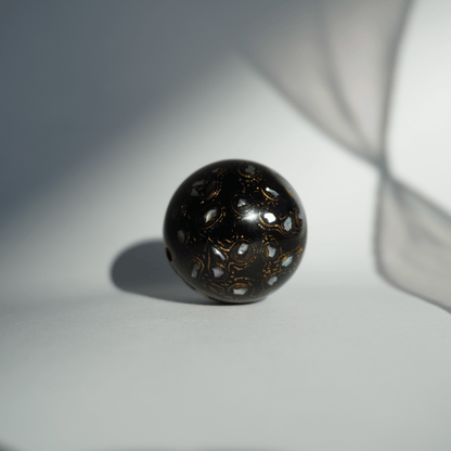 Rich Black bead with high-gloss black finish, hand-layered organic resin_1