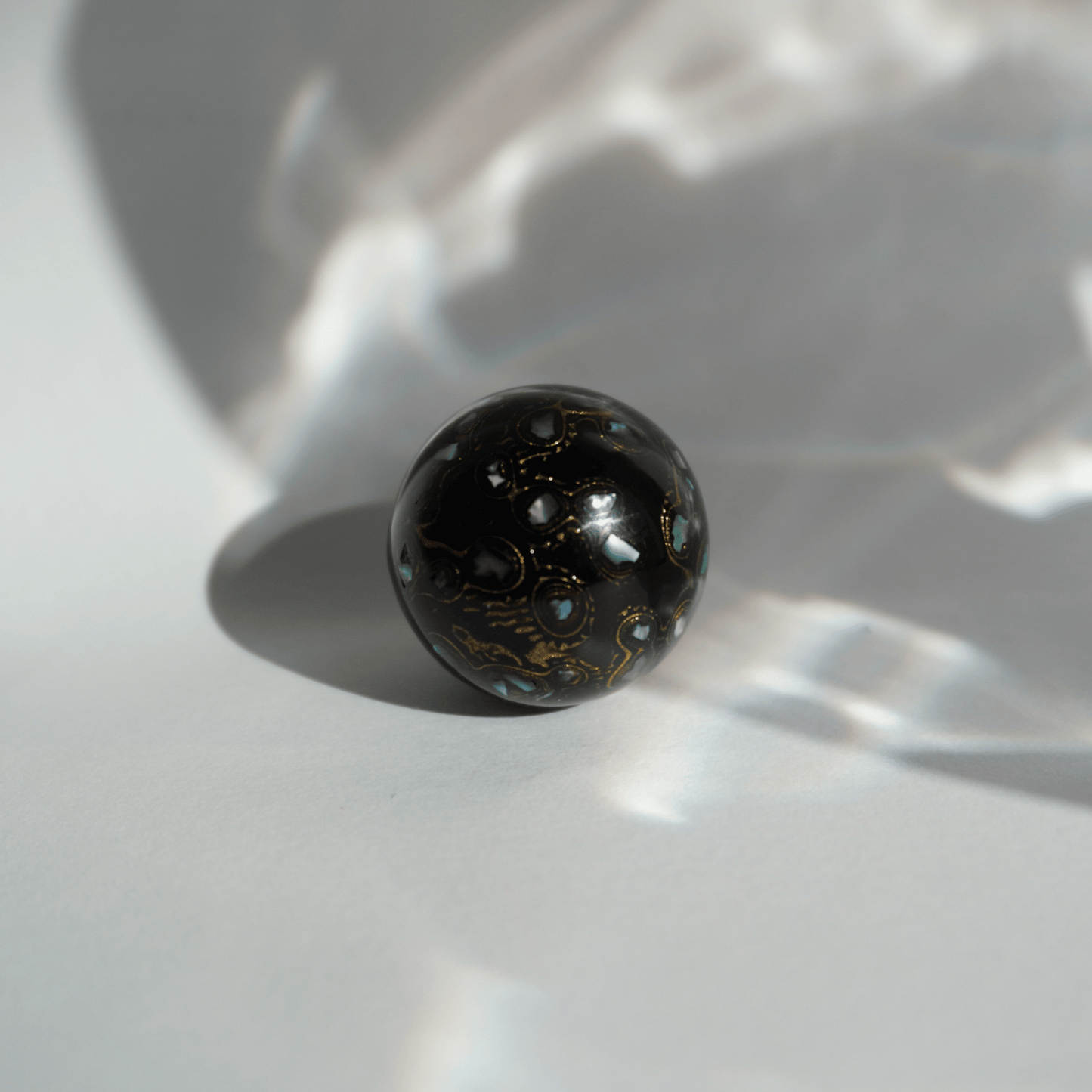 Rich Black bead with high-gloss black finish, hand-layered organic resin_2