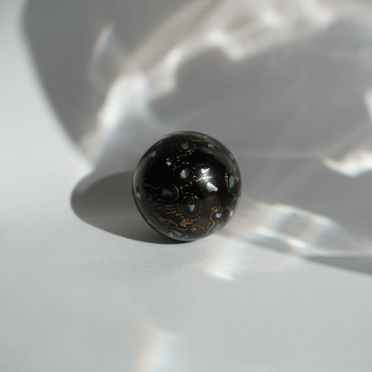 Rich Black ritual bead with high-gloss black finish, hand-layered organic resin_2