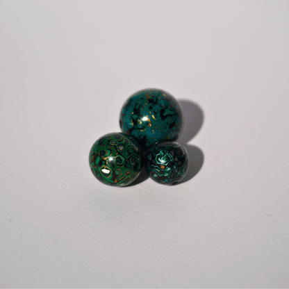Smoky Seaweed ritual bead in ocean green and grey, hand-layered resin_cluster