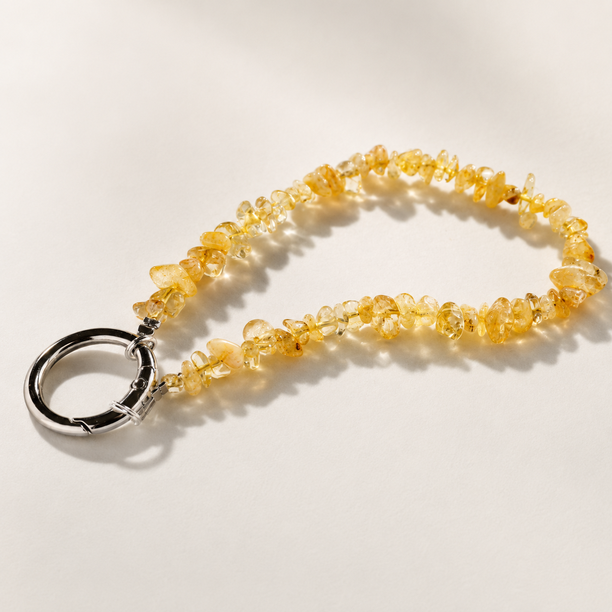 Natural yellow quartz stone phone charm with polished stone chips