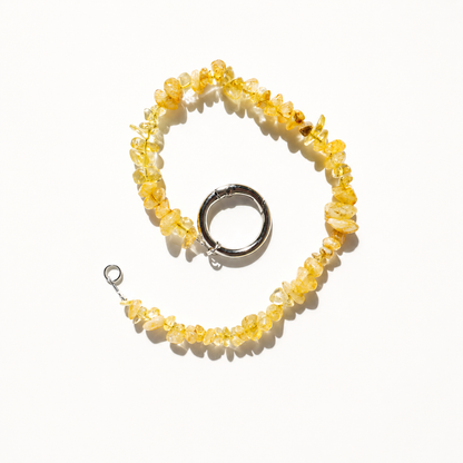 Natural yellow quartz stone phone charm with polished stone chips in a whirl