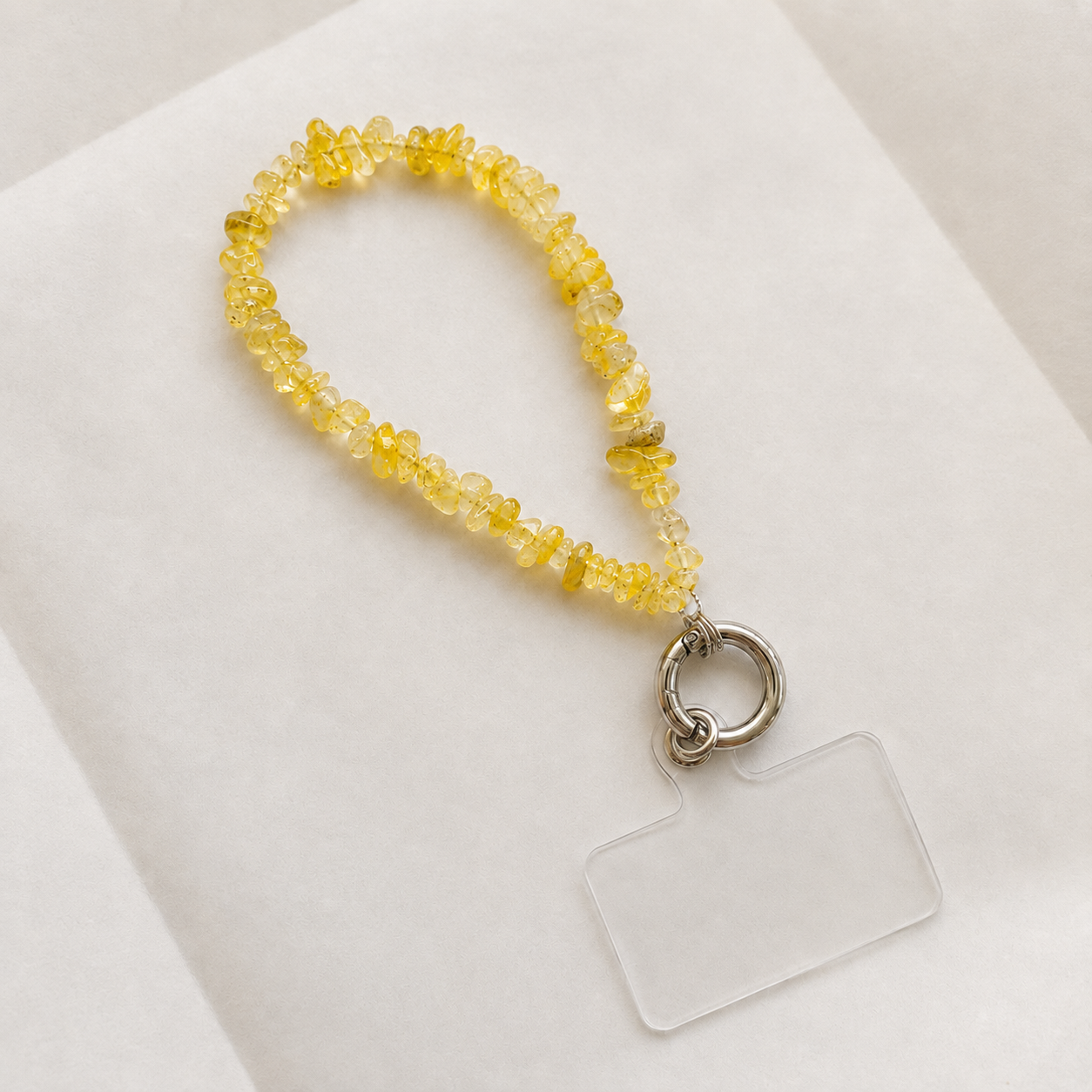 Natural yellow quartz stone phone charm installation with phone case adapter