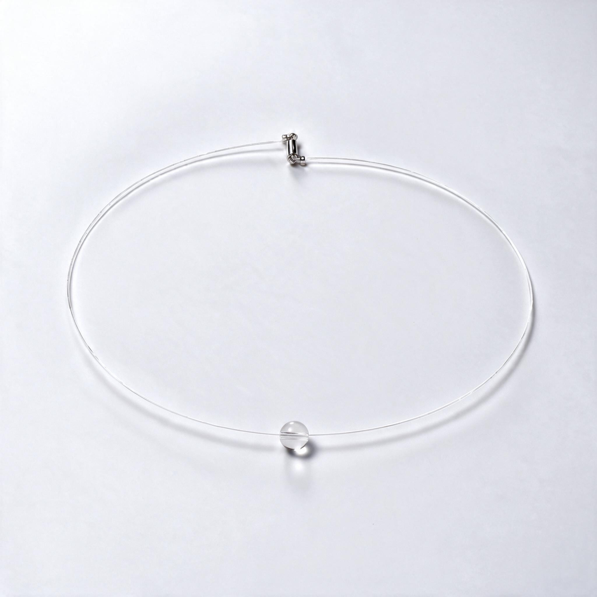 floating-bead-choker-sea-bulle-clear-quartz-falt-lay
